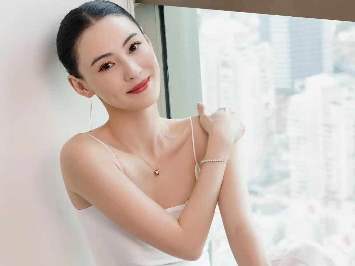 张芝明歌曲视频_张柏芝的经典歌声与情感传递_歌唱家张芝明简介